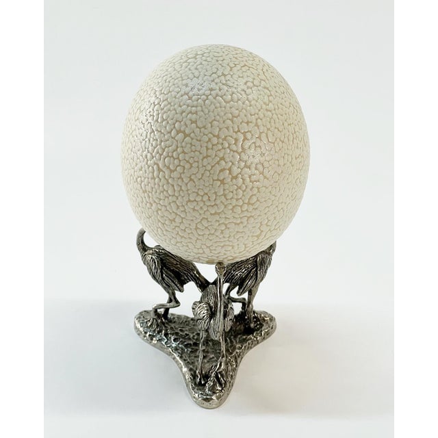 Pretty vintage ceramic faux ostrich egg on decorative pewter ostrich stand. Chic accessory for a bookcase approx 4.5" x...