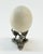 Pretty vintage ceramic faux ostrich egg on decorative pewter ostrich stand. Chic accessory for a bookcase approx 4.5" x...
