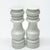 White salt & pepper shakers, group of 2. A gorgeous set of mid-century porcelain shakers. This set of minimal modern...