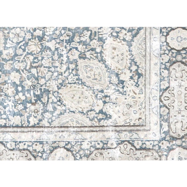 1960s Persian Kerman Rug. Hand woven in the Kerman region of Iran. Distressed and refinished in the U.S. The Persian...