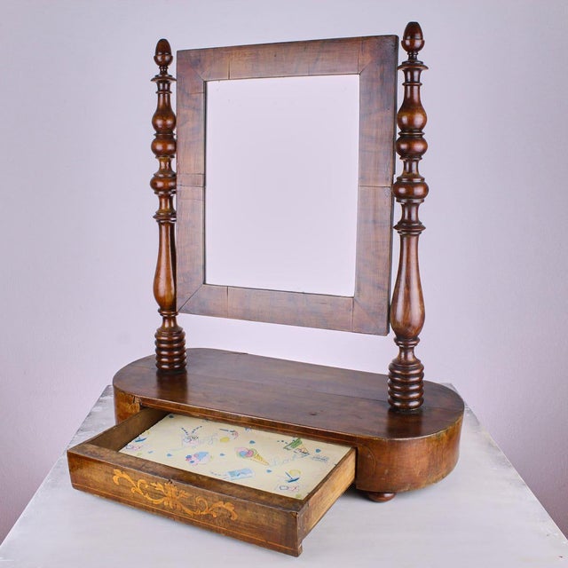 Carlo x threaded table mirror Height: 51 Width: 46 Depth: 20 This piece is attributed to the mentioned designer/maker. It...