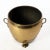 A gorgeous English brass jardiniere with copper rivet. Great as a decorative pot or planter and can be used to store...