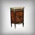 This half-moon shaped cabinet brilliantly embodies the refinement of the Louis XVI style, combining classicism with...