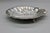 A lovely vintage silverplate shell-form dish, with a fluted clam shell bowl raised on small feet and a scrolled crest...