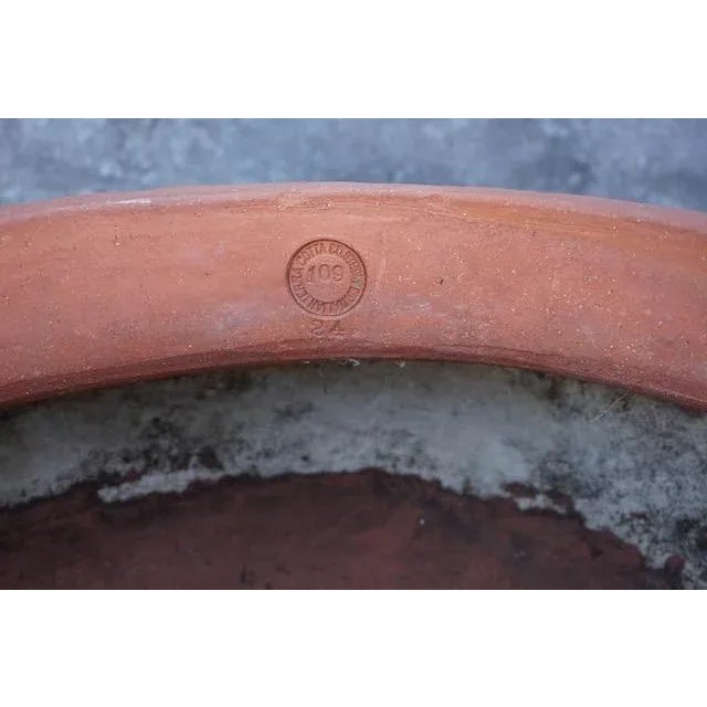 Minor cracks in rim. Measures 12" high x 24 1/2" diameter. Glorious in a garden setting. Can be, and has been, used as a...