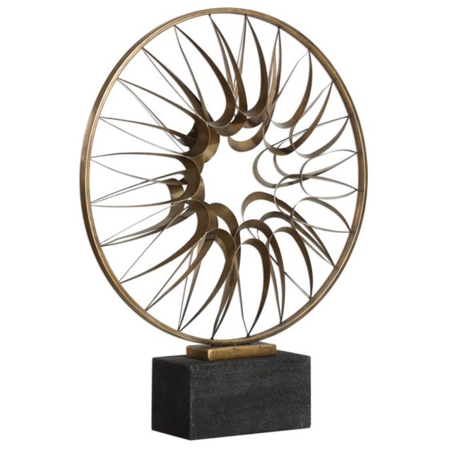 Antique Bronze Sculpture Set Atop A Textured Black Concrete Base.Uttermost-18895-Collection: Leyla, Material: Iron, Finish...