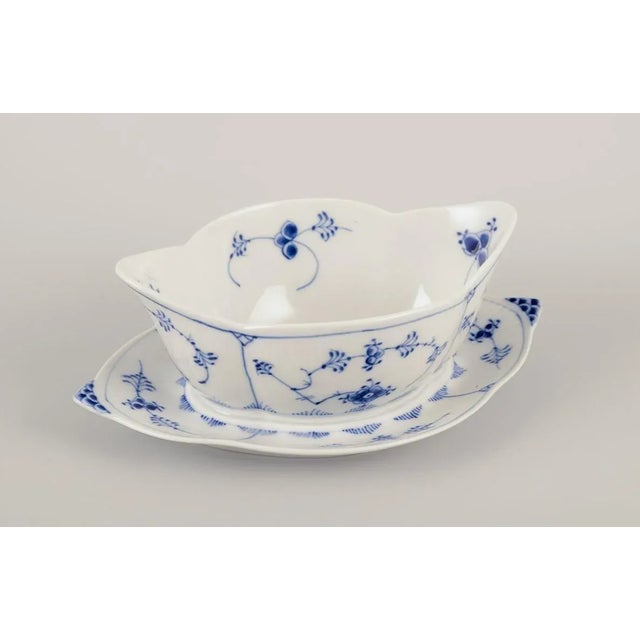 Royal Copenhagen Blue Fluted Plain. Gravy boat on foot. Hand-painted in blue. Model number: 1/204 Dated: 1975-1979....