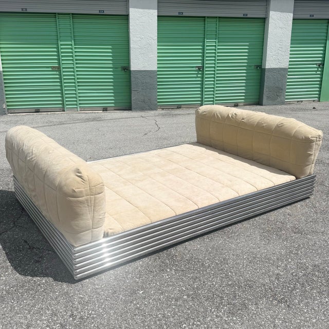 This bed will not fit in most elevators or pass through most stairwells. The metal from does not come apart, please...