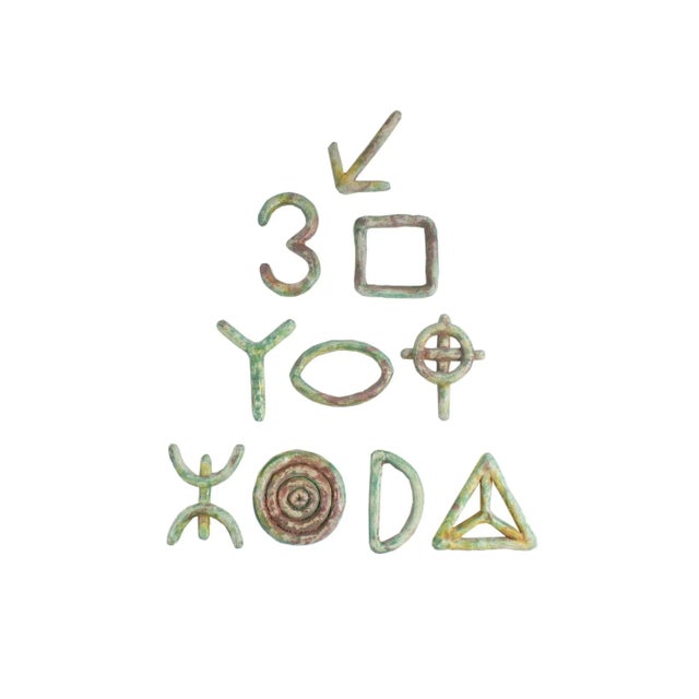 A 1991 set of ten ceramic wall sculptures by the American artist Ana England (born 1953). From England's "Essential...