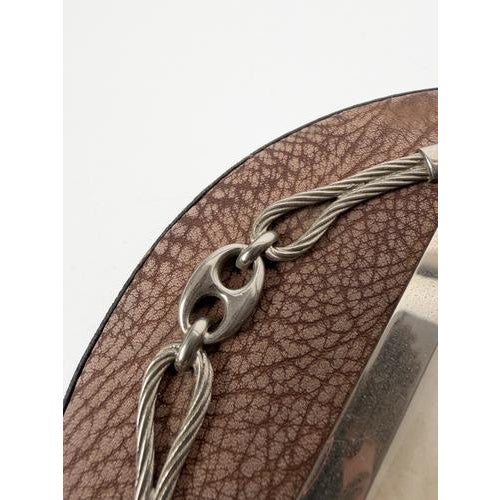 Refined mid-20th-century tabletop photo frame attributed to the Italian luxury brand Gucci. This vintage photo frame,...