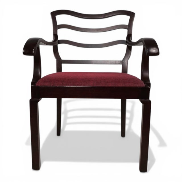 This elegant armchair, in the style of a classic Captain's Chair, impresses with its clean, period-typical Art Deco...