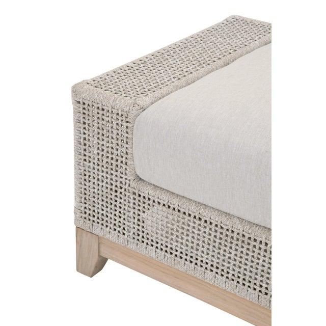 Composed of squared lines, an exposed wood base, and a rope frame, this alluring outdoor ottoman will be an ideal addition...