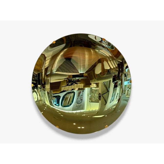 Contemporary, Concave Glass, Brass, Vintage Green Modern Space Age Wall Mirror A modern space age wall mirror featuring a...