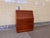 This secretary, designed by Dyrlund in Denmark, is a refined example of thoughtful and functional design. It features a...