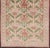 Measures: 6'5 x 12'0 Antique Spanish Gallery Rug with Coral, Olive, and Cream Floral Design. Keivan Woven Arts /...