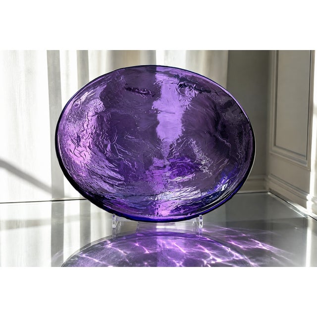 A large and sculptural Murano art glass platter or centerpiece, Italy, circa 1960s–1970s, distinguished by its substantial...