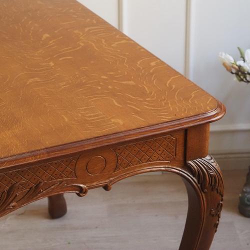 Dining tables with curved legs and finely ornamented aprons were frequently created in the late 19th and early 20th...