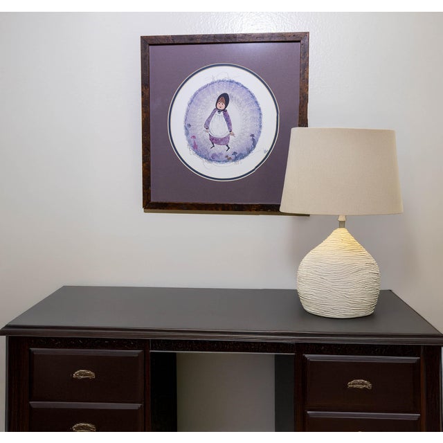 This charming 1985 work by the renowned 'People's Artist,' P. Buckley Moss, captures her signature style with delicate...