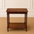 This elegant 19th Century English oak two-tier side table showcases the timeless craftsmanship and refined proportions...