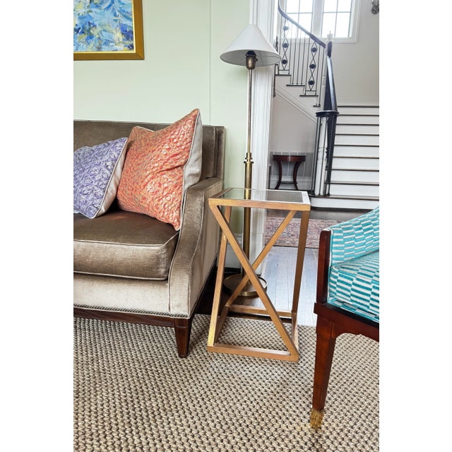 Pair of “Z” metal accent tables with antiqued mirrored tops from Bliss Studio Adorable pair of metal accent tables with...