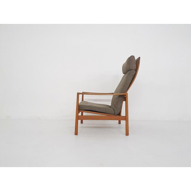 High back lounge chair by Hartmut Lohmeyer for Wilkhahn, Germany The cover of the brown grey cushion has been washed. The...