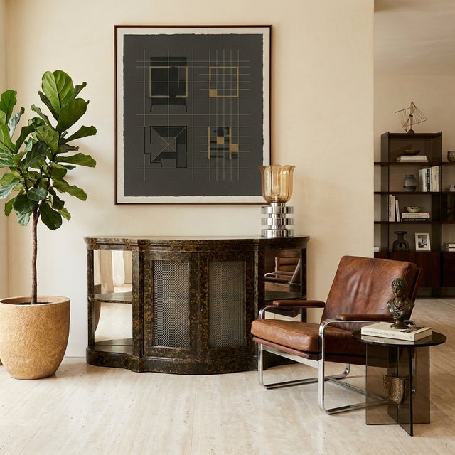 This 1970s Mastercraft cabinet features a lacquered faux tortoise shell finish and design details commonly associated with...