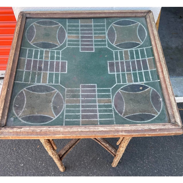 Charming vintage game table in the Adirondack taste, combining rustic willow-branch construction with a wonderfully...