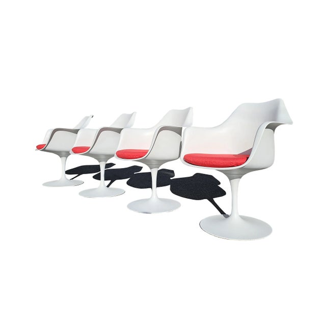 Early tulip chairs from the 1960’s. Designed by Eero Saarinen for Knoll. Old label pre 1969. Knoll fabric. Dimensions :...