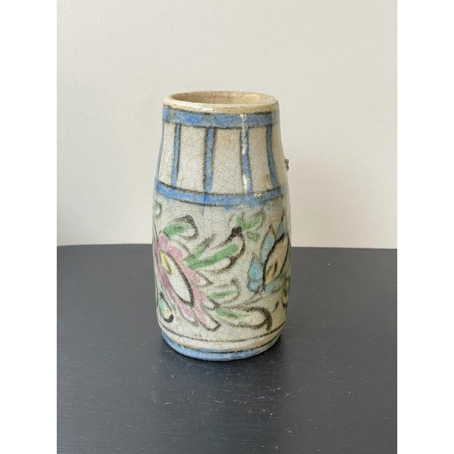 Discover cultural heritage with our set of 2 Small Round White Qajar vases from Iraq—a pair stunning pieces that reflect...