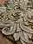 Add a striking statement of texture and glamour to your interior with this exceptional, oversized round wall medallion....