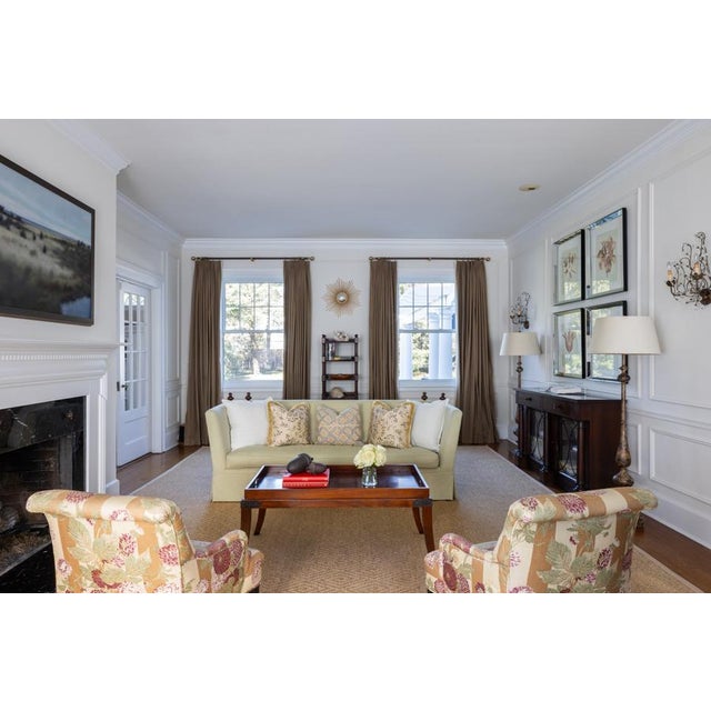 Custom-made cotton sateen curtain panels in a pale brown/cafe au lait color, bordered horizontally on one side with a...