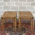 A set of four Heritage Furniture French Louis XVI golden walnut nesting tables featuring highly figured walnut paneled...