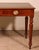 Elegant small mahogany desk from the 19th century in England. This beautiful desk features two drawers in the apron. The...