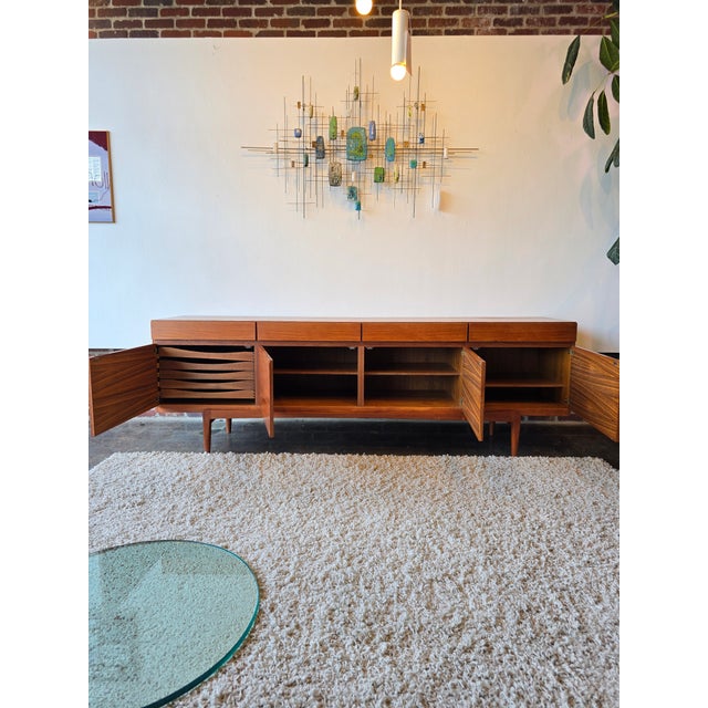 Stunning grain. Built like a brick house. B+ original vintage condition on this Model 66 designed by IB Kofod-Larsen for...