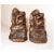 Up for sale is a large pair of antique figural bronze clad nude cherub bookends made by Armor Bronze Co.. Each is in the...
