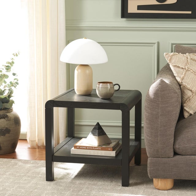 Experience the allure of simplicity and elegance with the Omara 1 Shelf Coffee Table. This stylish piece, artfully...