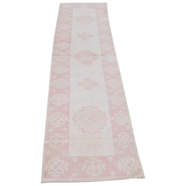 Vintage Turkish Anatolian hand knotted wool rug with natural colors.