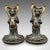 This is a pair of antique decorative cherubs. An English, bronze doorstop or fireside figure, dating to the late Victorian...