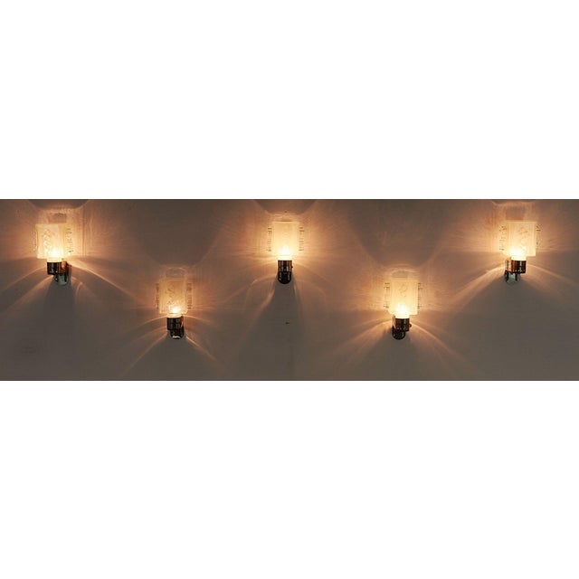 An exceptionally rare and stunning set of 5 vintage Italian wall sconces, designed by Albano Poli for Poliarte in the...
