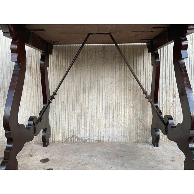 18th century Catalonian dining table with Baroque style lyre legs This Spanish 18th century table features a rectangular...