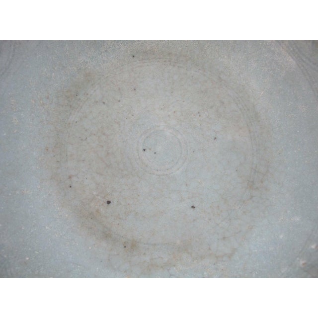 Antique Sawankhalok style large Celadon bowl, originating from Thailand. This piece is in the style of 14th to 15th...