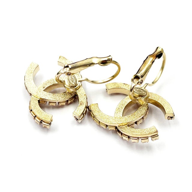Chanel Gold CC Fuchsia Crystal Lever Back Piercing Earrings * Marked 12 * Made in France * Comes with original box -It is...