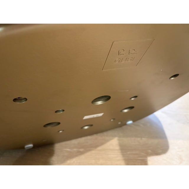 Technical Specifications Brand: GUBIDesigner: Pierre Paulin (1975) Upholstery Material: Aniline Leather (Dunes - 21002...
