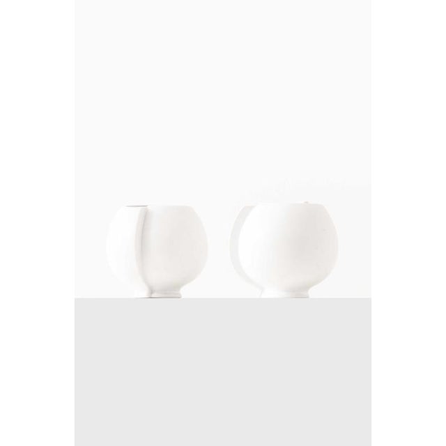 These stoneware vases, model surrea, were designed by wilhelm kåge and produced by gustavsberg in sweden, exemplifying the...
