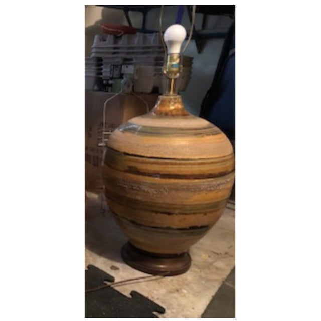 The base is great, but the shade was gross and has been tossed. Table lamp is 45" to top of finial.