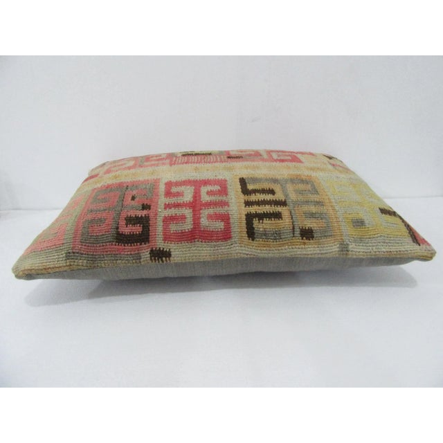 Handmade decorative pillow cover made from a vintage Turkish kilim rug. Backed with good quality cotton fabric. Pillow...