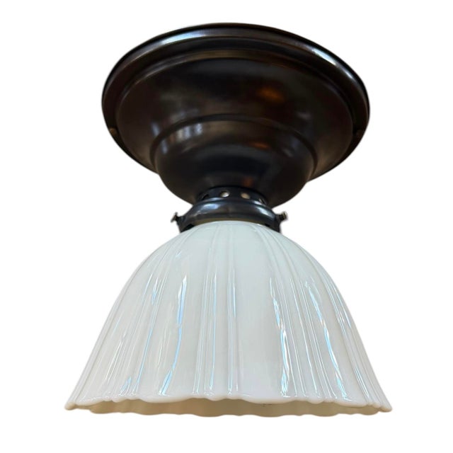 This Shefield style light fixture is perfect for any room. Great for areas with lower ceilings. Original canopy holder has...