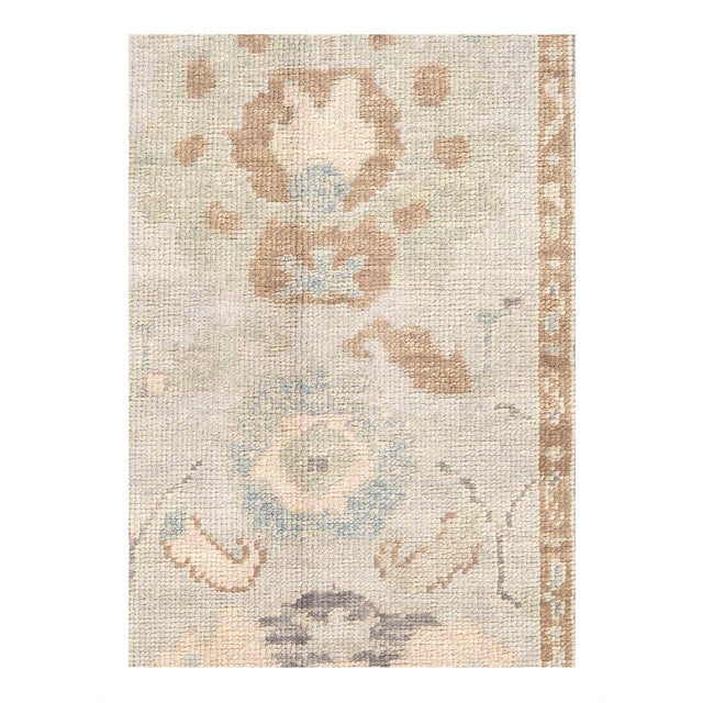 Hand knotted Turkish Oushak rug made of hand-spun lamb's wool rug and all natural dyes. Each rug has a dense, soft pile,...