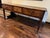 This exceptional early 19th-century sideboard table is a rare example of true American handcrafted furniture, built circa...
