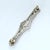 Traditional Mid 20th Century Elongated Platinum Brooch With 3 Diamonds and Filigree Design For Sale - Image 3 of 4
